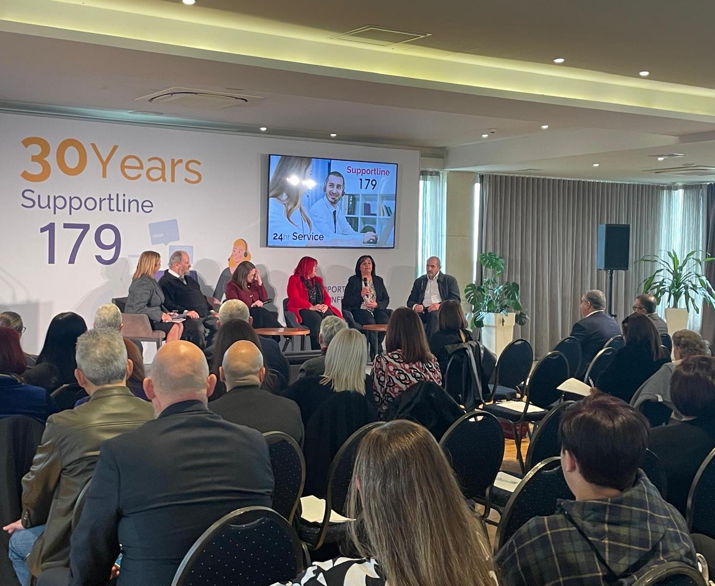 Volunteers and staff of supporline 179 shared stories during an event held to mark 30 years of the service.