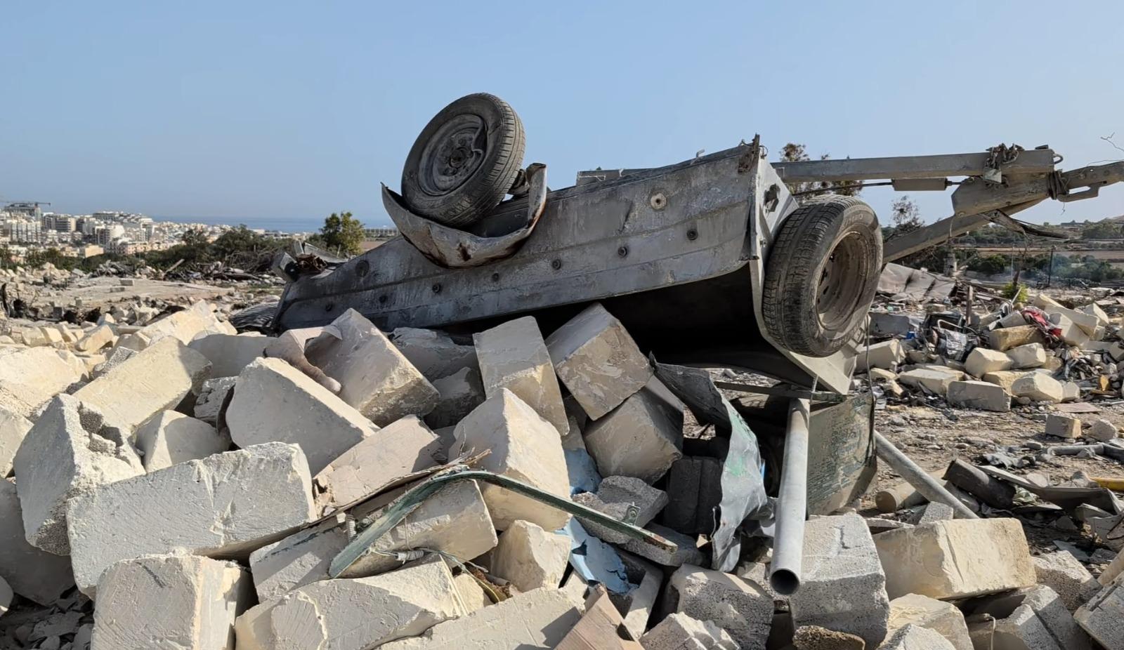 The explosion left the fields covered in debris.