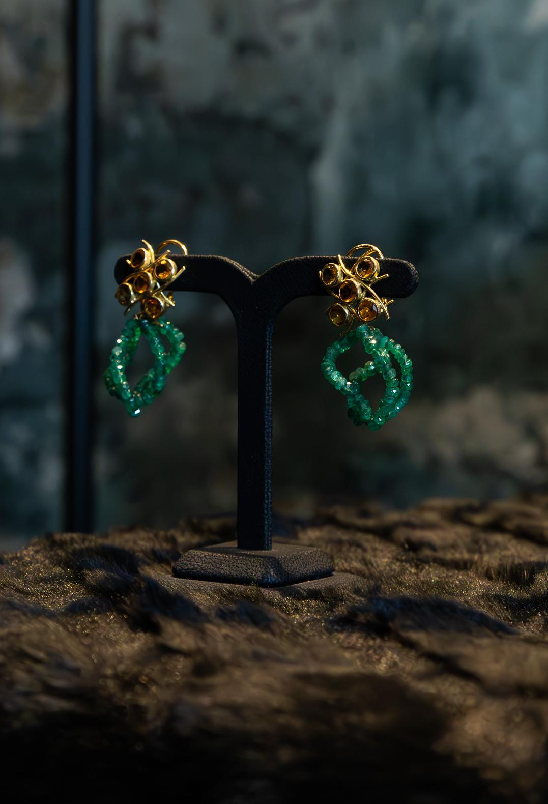 A pair of distinct earrings by Maria João Bahia.