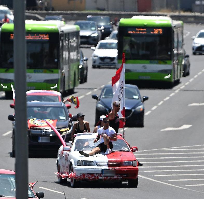 Blatantly flouting the law. PL supporters were seen hanging out of cars and trailers while celebrating their party&rsquo;s win at the general election. File photo: Times of Malta