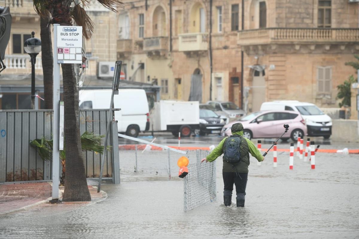 By the afternoon, the sea levels in Marsascala seemed to have risen, leaving the road in Triq ix-Xatt flooded. Photo: Matthew Mirabelli