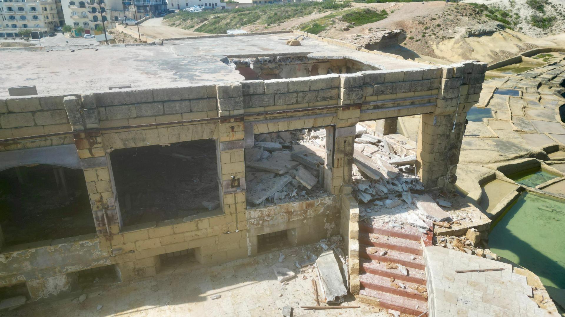 Debris from the ceiling spread across the battery's interior.