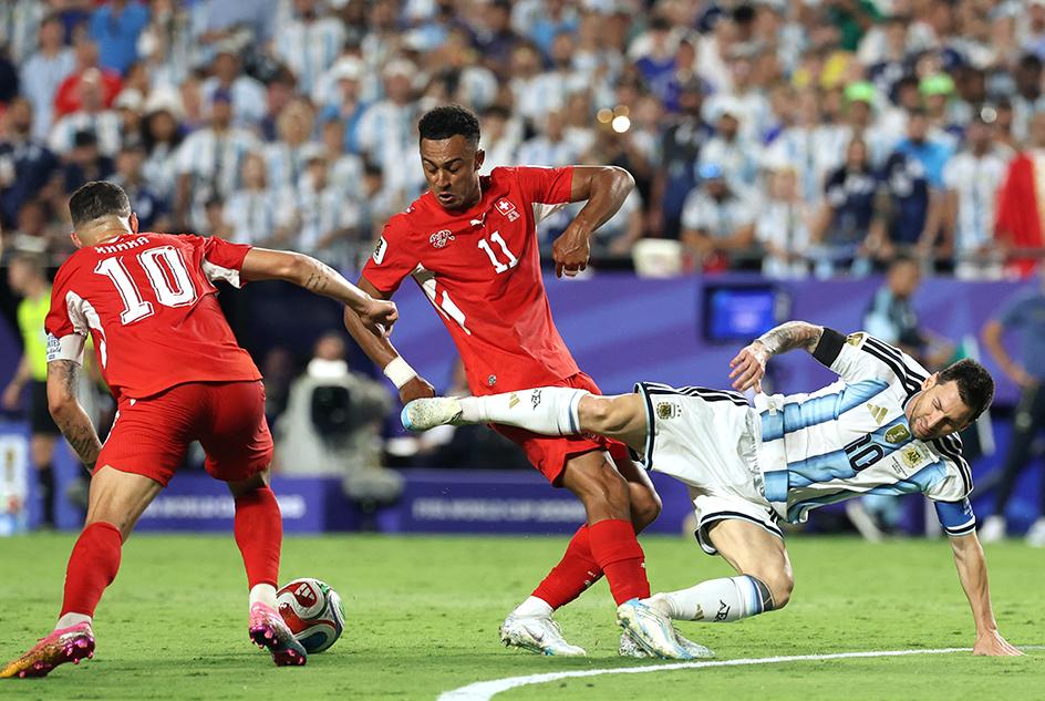 Argentina&rsquo;s forward Lionel Messi fights for the ball with Switzerland&rsquo;s midfielder Granit Xhaka and Switzerland&rsquo;s forward Dan Ndoye. Photo: Thomas COEX/AFP