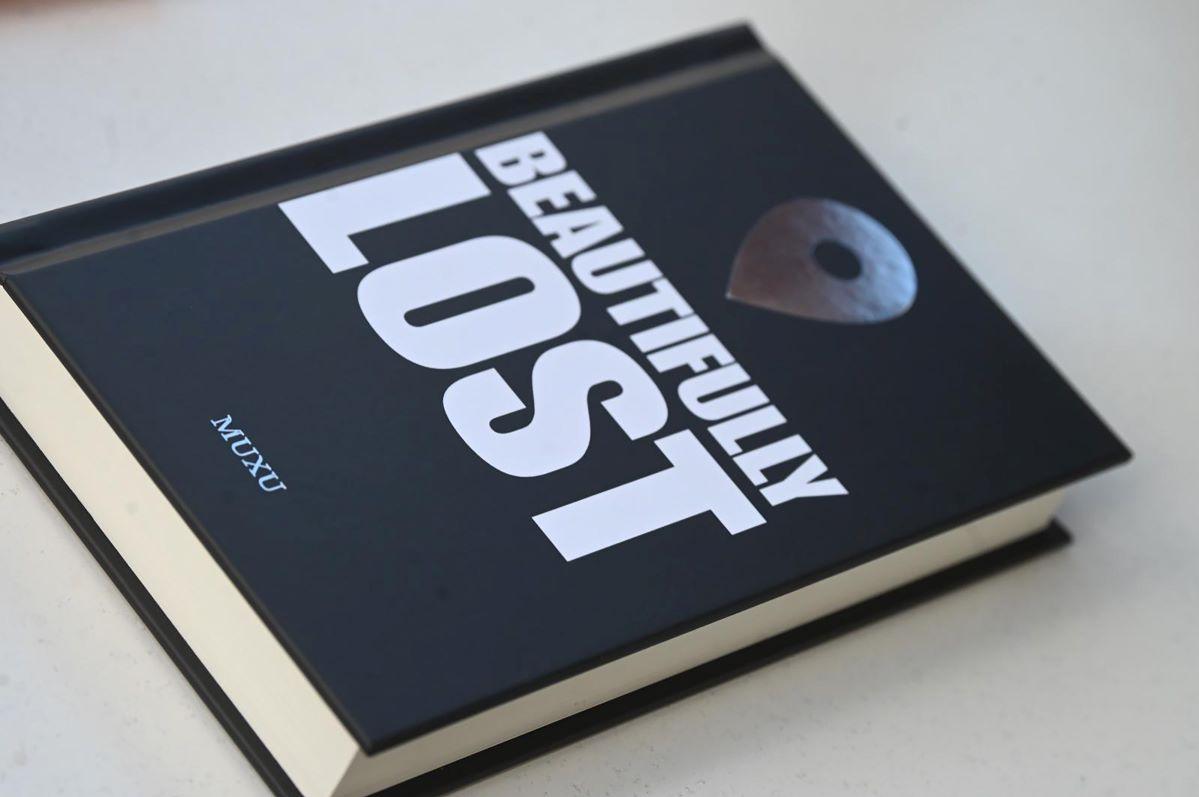 Muxu took five years to write his first book.