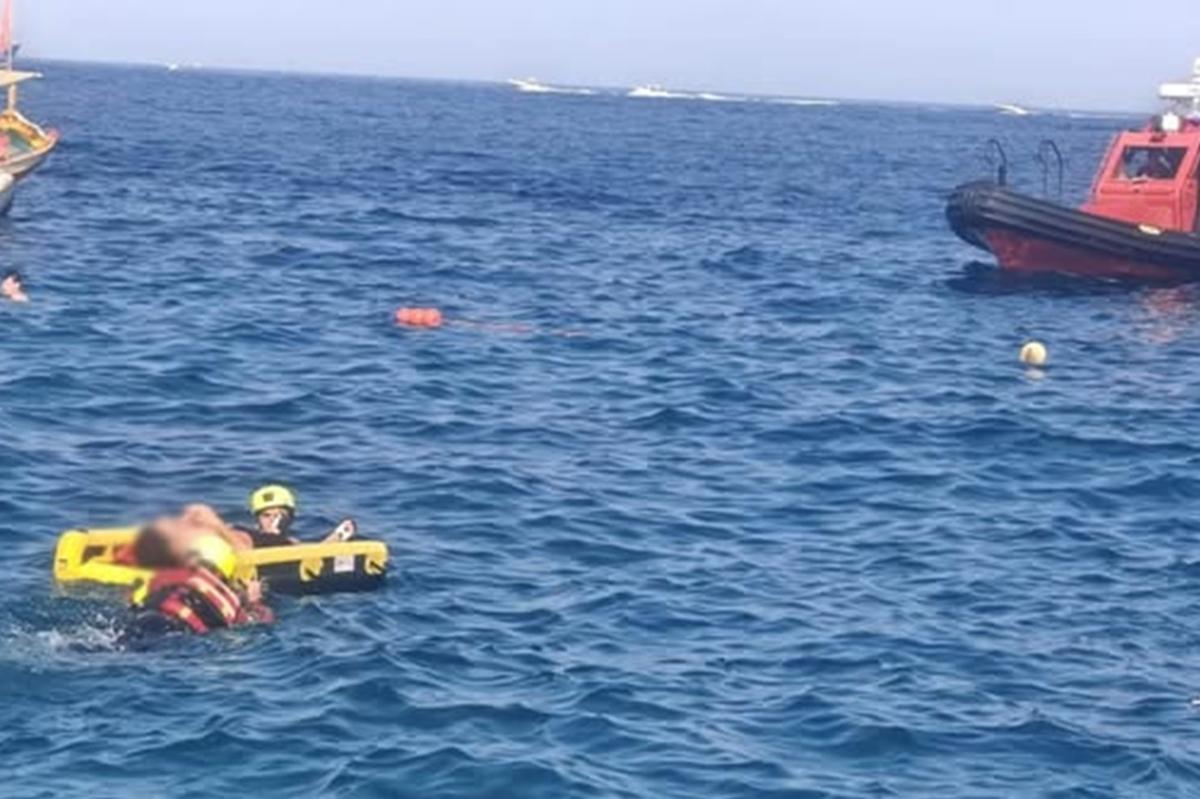 An inflatable stretcher was used to bring the man to shore.