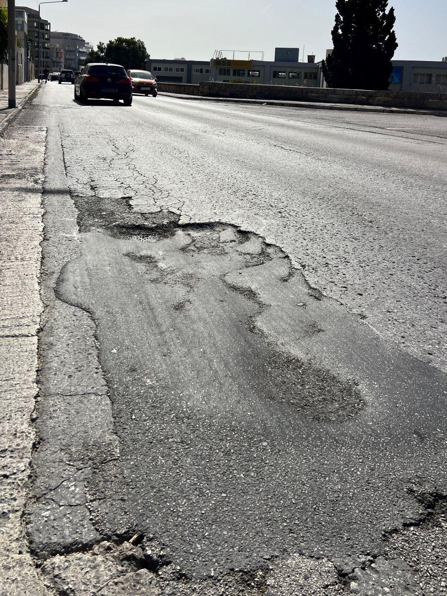 Parts of the road are once again full potholes.
