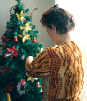 Nancy* as she set up a Christmas tree during her<br />interview with The Times in December. Photo:<br />Matthew Mirabelli