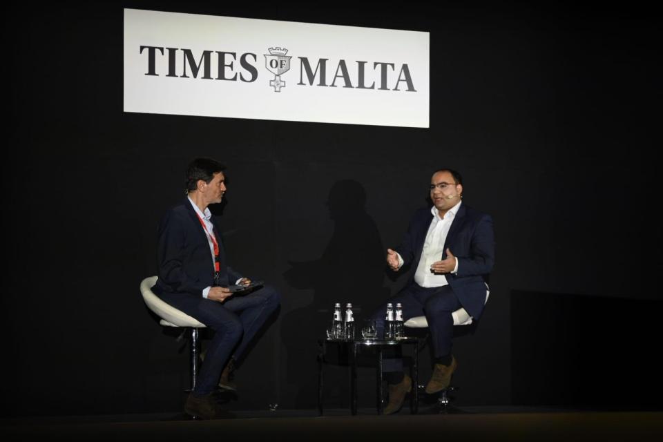 Finance Minister Clyde Caruana (right) in conversation with Times of Malta editor-in-chief Herman Grech. Photo: Matthew Mirabelli