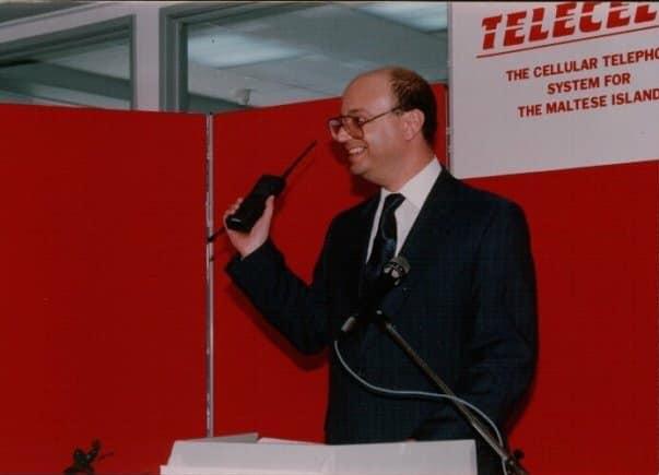 Zammit Dimech launching the first mobile phone in Malta in 1990 as Communications Minister. Photo: Facebook/Francis Zammit Dimech