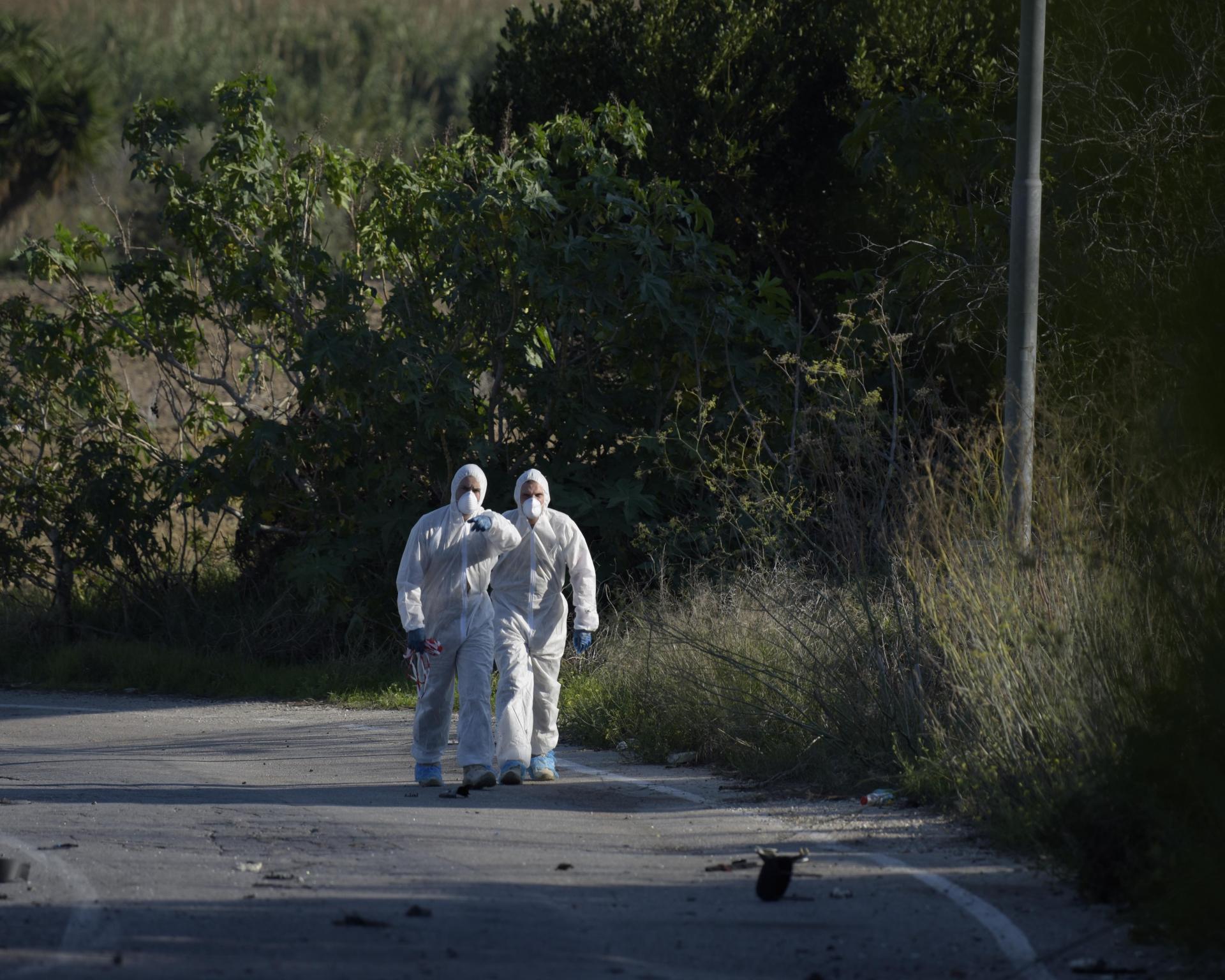 Forensic investigators at the scene where journalist Daphne Caruana Galizia was murdered in October 2017. Photo: Mark Zammit Cordina