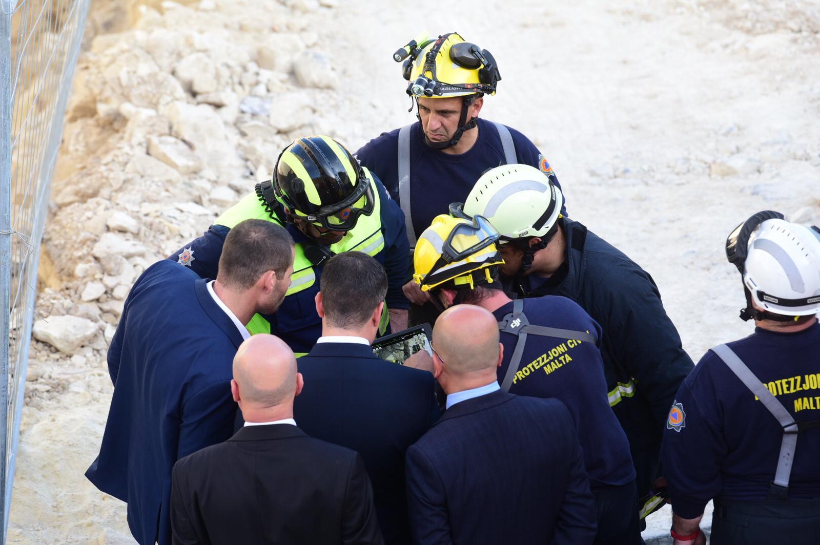 Prime Minister Robert Abela is briefed at the scene. Photo: Mark Zammit Cordina