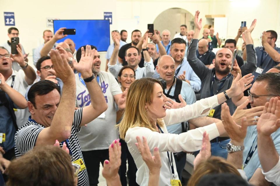 Roberta Metsola embraces fellow MEP candidate David Agius. Photo: Jonathan Borg