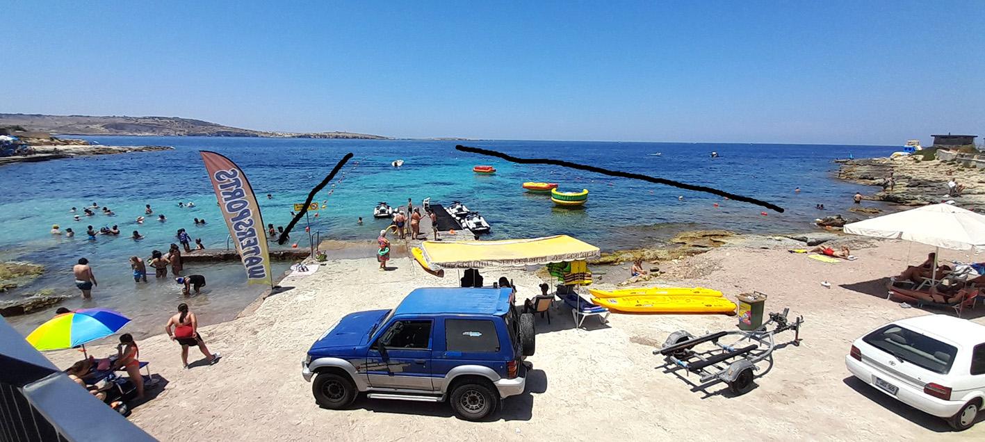 A jet ski operator has taken up the best part of the bay in Buġibba. Photo: Mary Attard