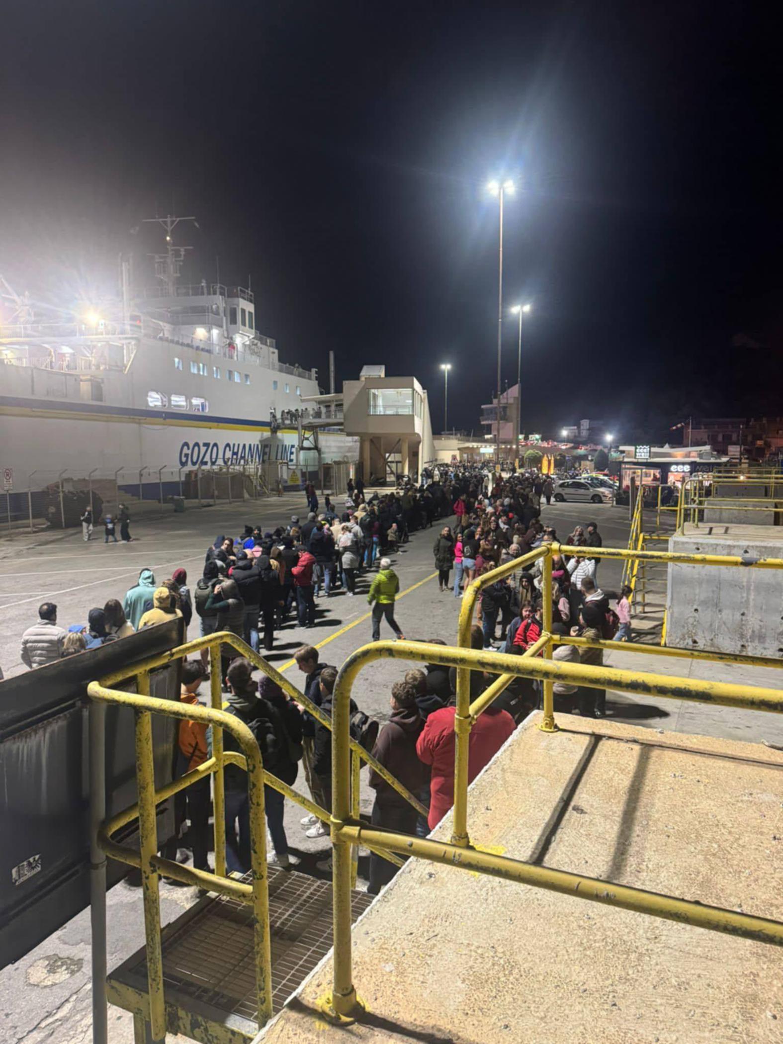 On Friday evening the foot passenger queue for the ferry stretched for a couple hundred metres. Photo: Facebook/Kevin Cauchi
