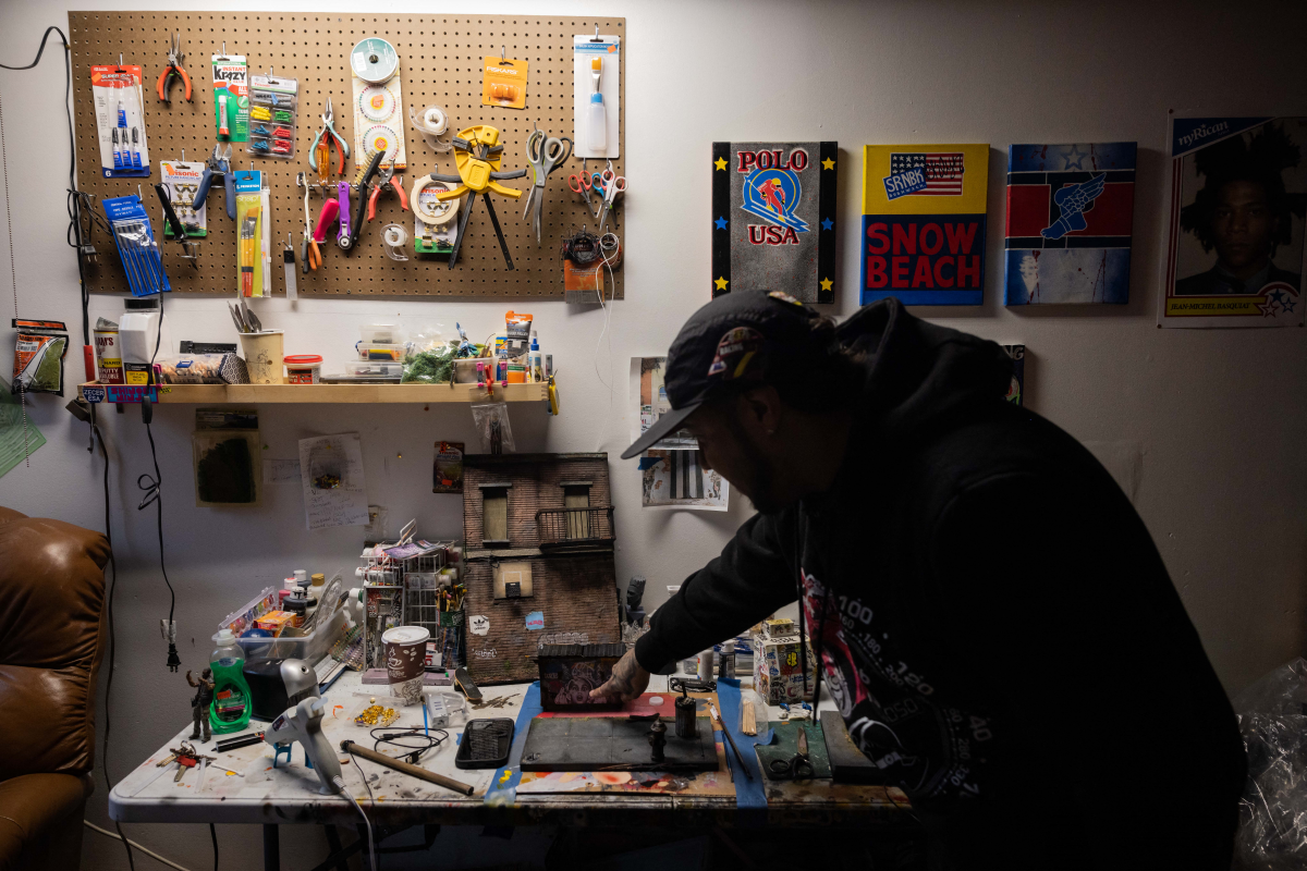 With his nimble fingers and child-like enthusiasm, Cortes re-creates in miniature the hip-hop-infused street scenes of a gritty New York.