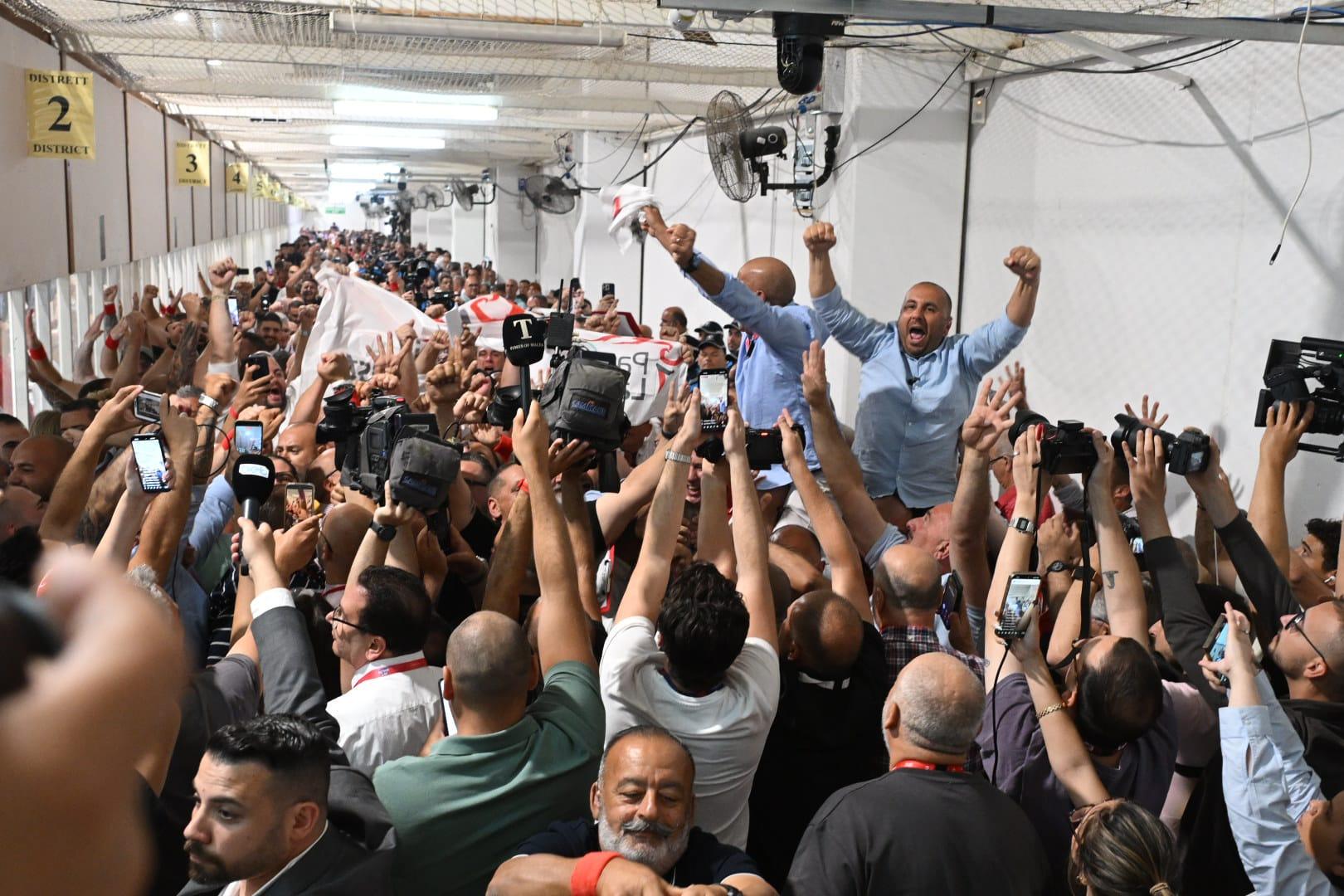 Jubilant Labour supporters at the counting hall. Photo: Matthew Mirabelli