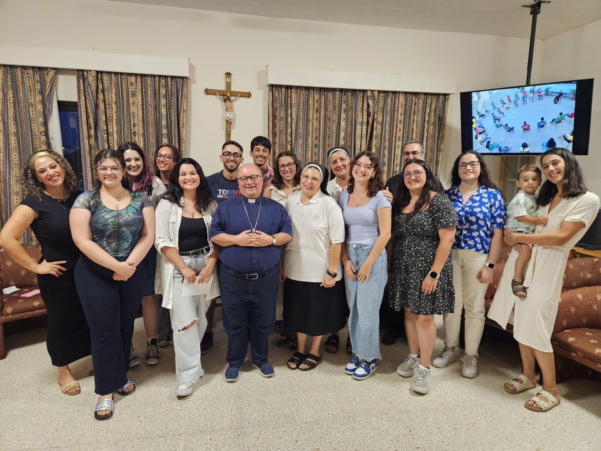 The group with the archbishop during the farewell live-in.