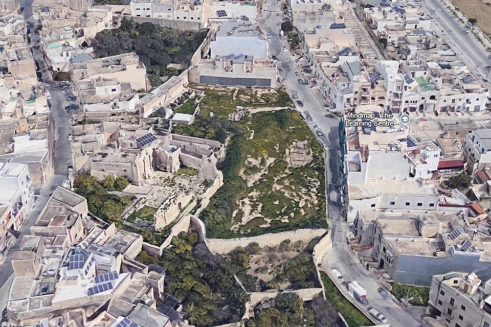 If the PA approved the zoning application, the vacant land found between Siġġiewi's former parish church and UCA will become a residential area. Photo: Google Maps.
