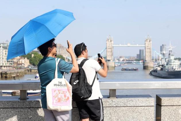 The UK swelters in hottest June day on record