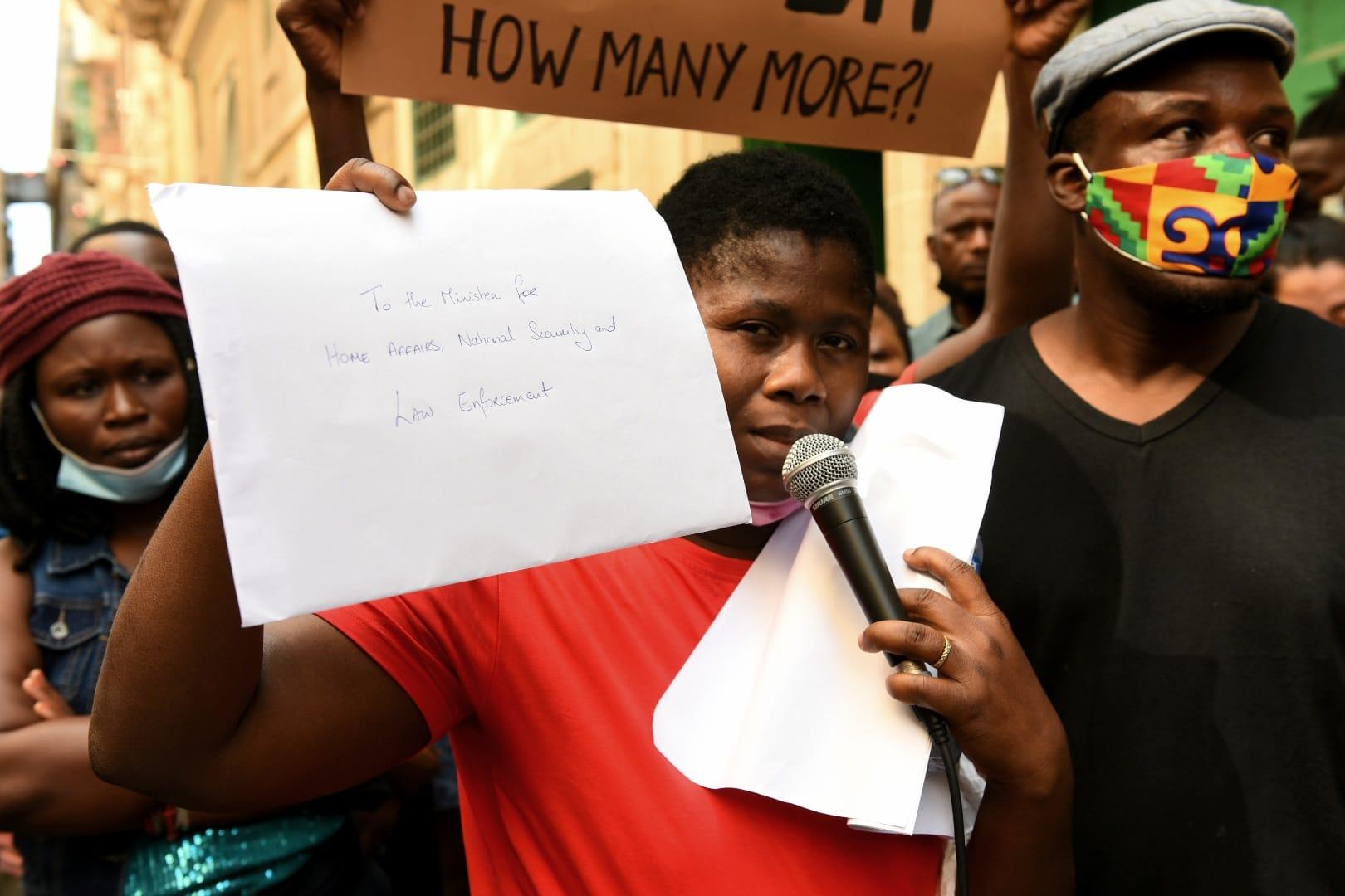 Doris Doku delivers a letter to the home affairs ministry. Photo: Chris Sant Fournier