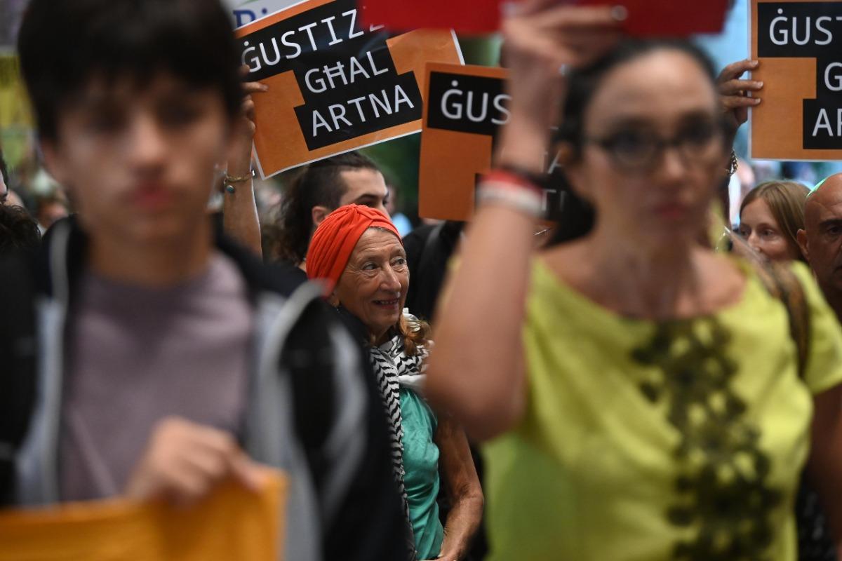 Yana Mintoff stands with activists. Photo: Chris Sant Fournier