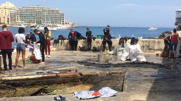 A dive team hard at work, cleaning Malta's seas. Photo: Maarten van Alkemade