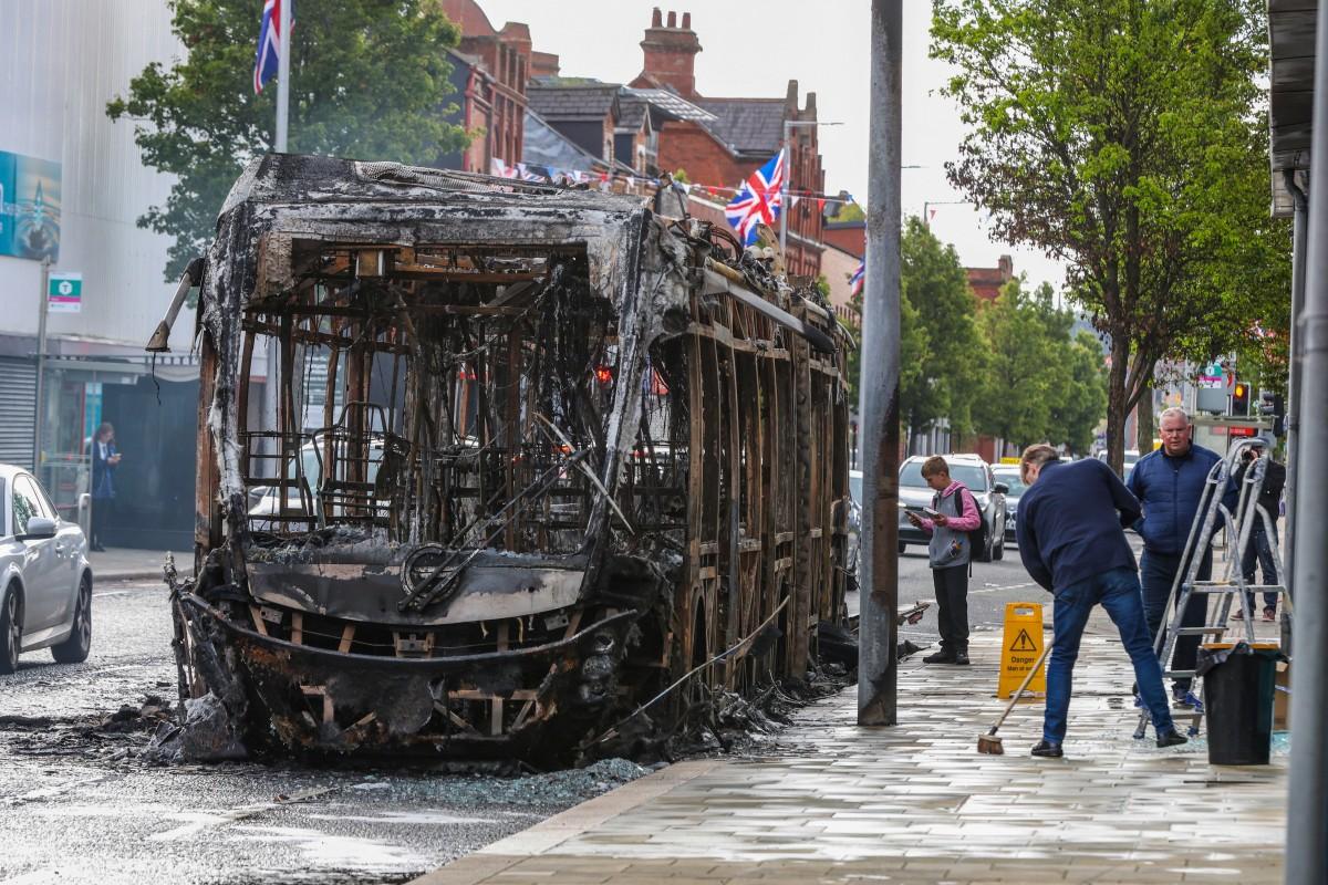 A burnt-out "Glider city bus" is pictured after demonstrations turned violent the night before. Photo: AFP