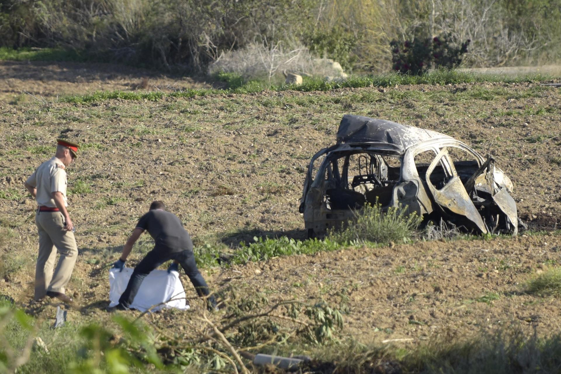 The aftermath of the car bomb that killed Daphne Caruana Galizia in October 2017.