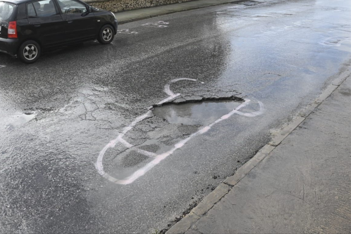 The state of the road and the spray painted penis back in January. Photo: Matthew Mirabelli