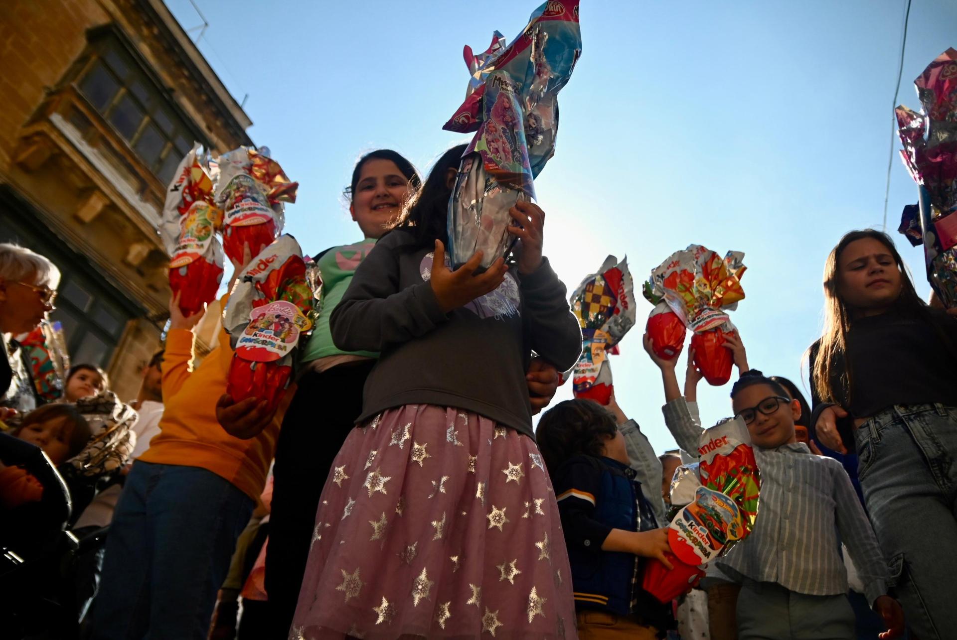 All smiles, as children have their Easter eggs blessed. Photo: Jonathan Borg