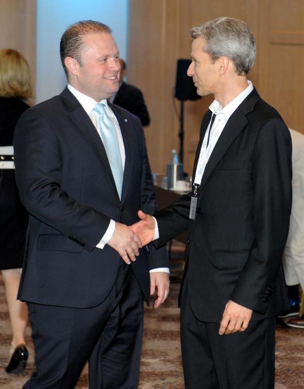 Former Prime Minister Joseph Muscat (L) with Henley &amp; Partners chairman Christian Kaelin in 2014. File photo: Matthew Mirabelli.