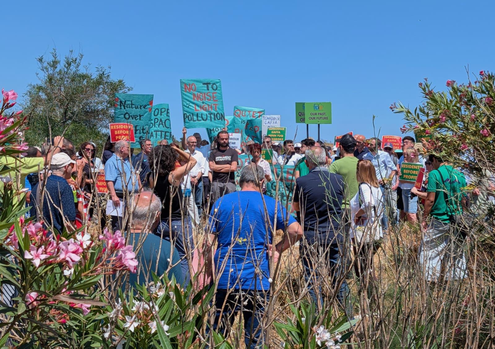 Residents and activists gathered on land to be developed into a sporting complex in Pembroke. Photo: Chris Sant Fournier