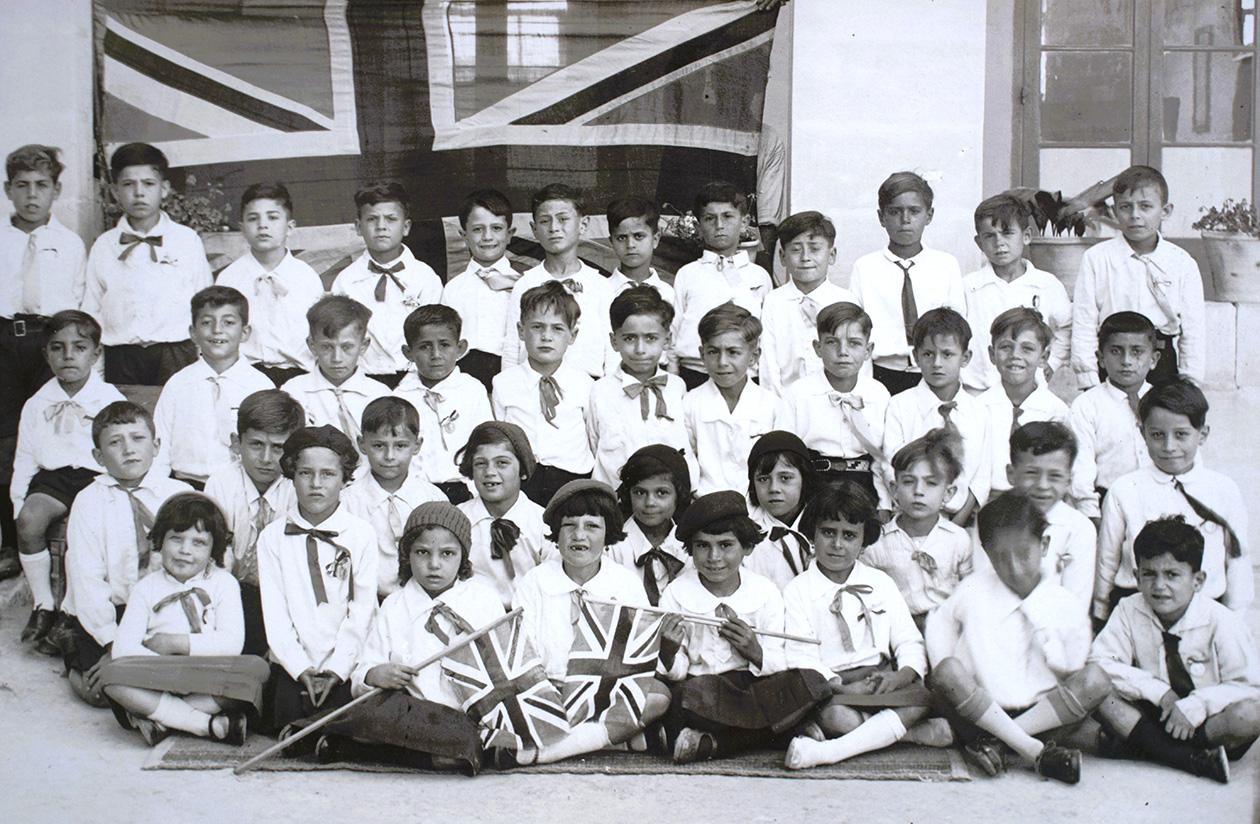 Schoolchildren celebrating the coronation of King George VI in 1937.