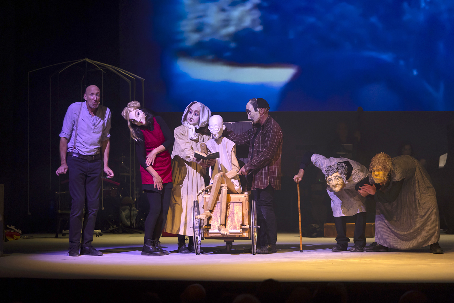 The performers assisted Leli onto a wheelchair.