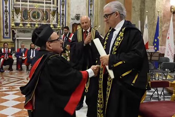 Michael Bugeja receiving his honorary degree during the ceremony.