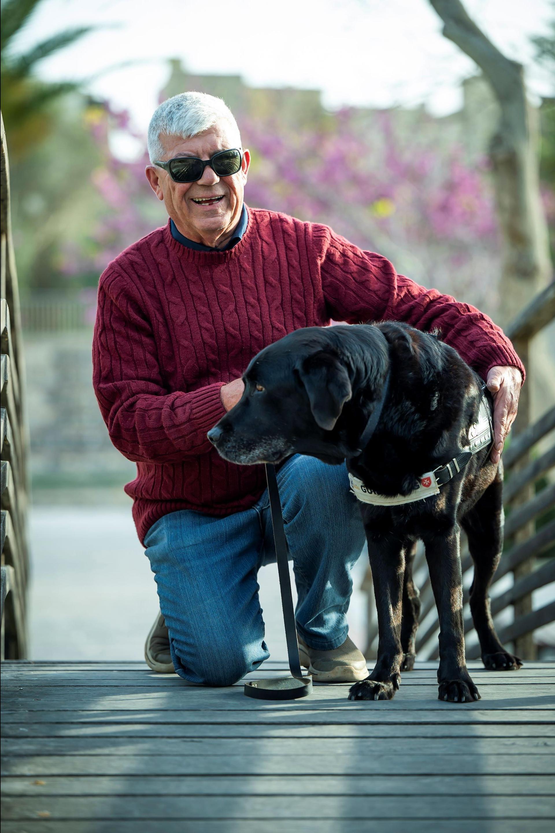 Michael had been hoping to attend the launch of a photographic exhibition that included an image of him and his former guide dog Justy, who has since died. Photo: Rene Rossignaud