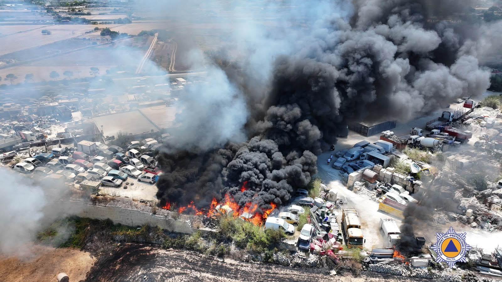 The fire escalated into an industrial blaze as a number of cars and other "rubbish" burnt. Photo: CPD