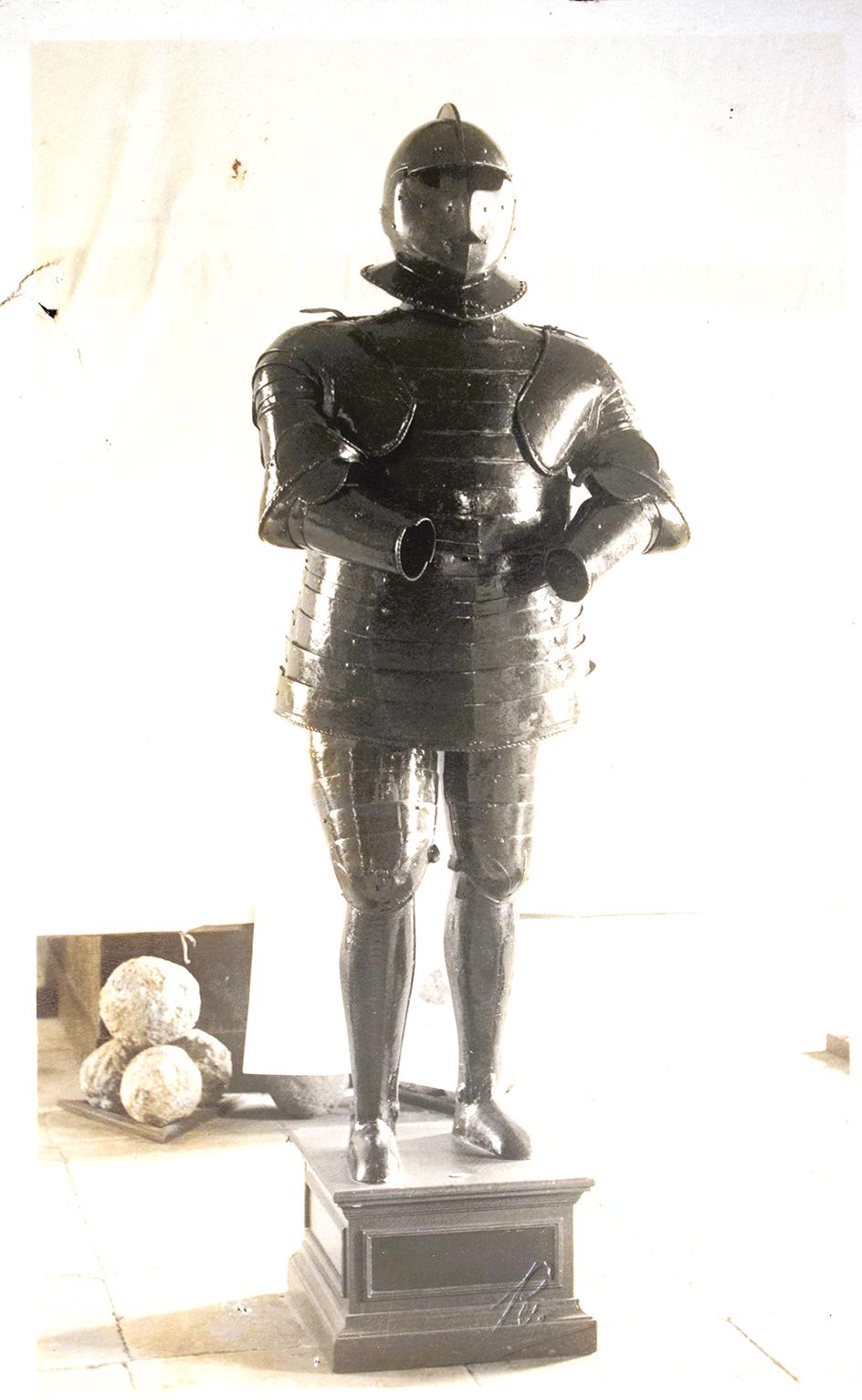 Postcard by Richard Ellis of a full suit of armour