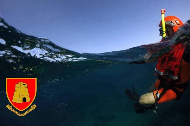 Teenager rescued in rough seas
