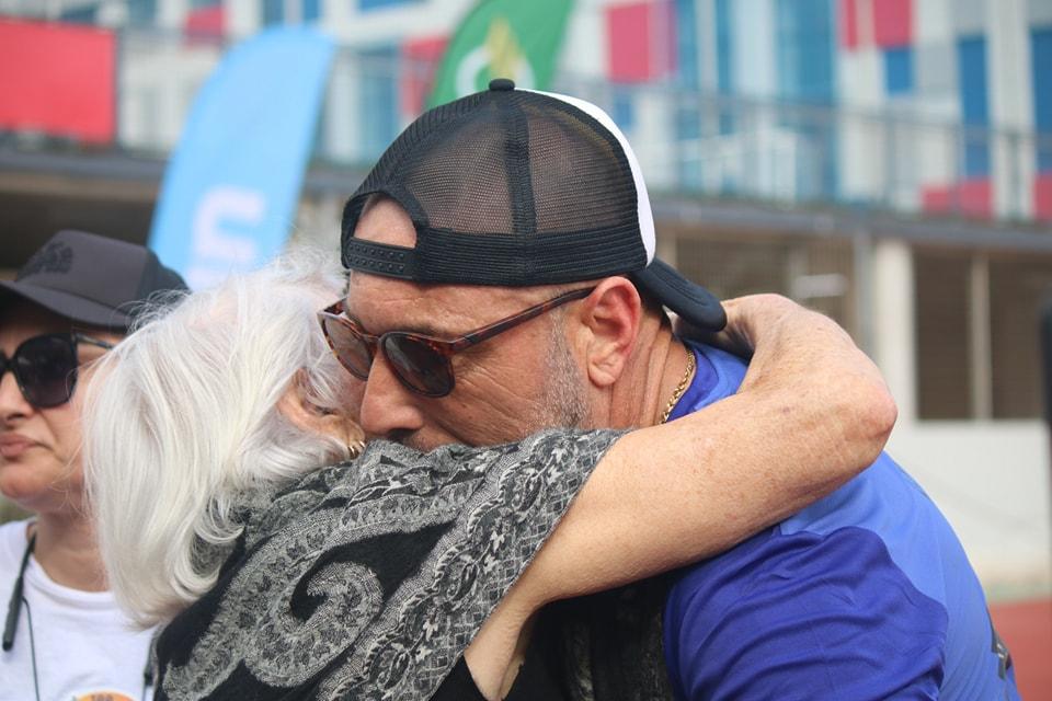 Miguel hugging his mother after completing 100miles in under 24 hours. Photo: Caritas Malta
