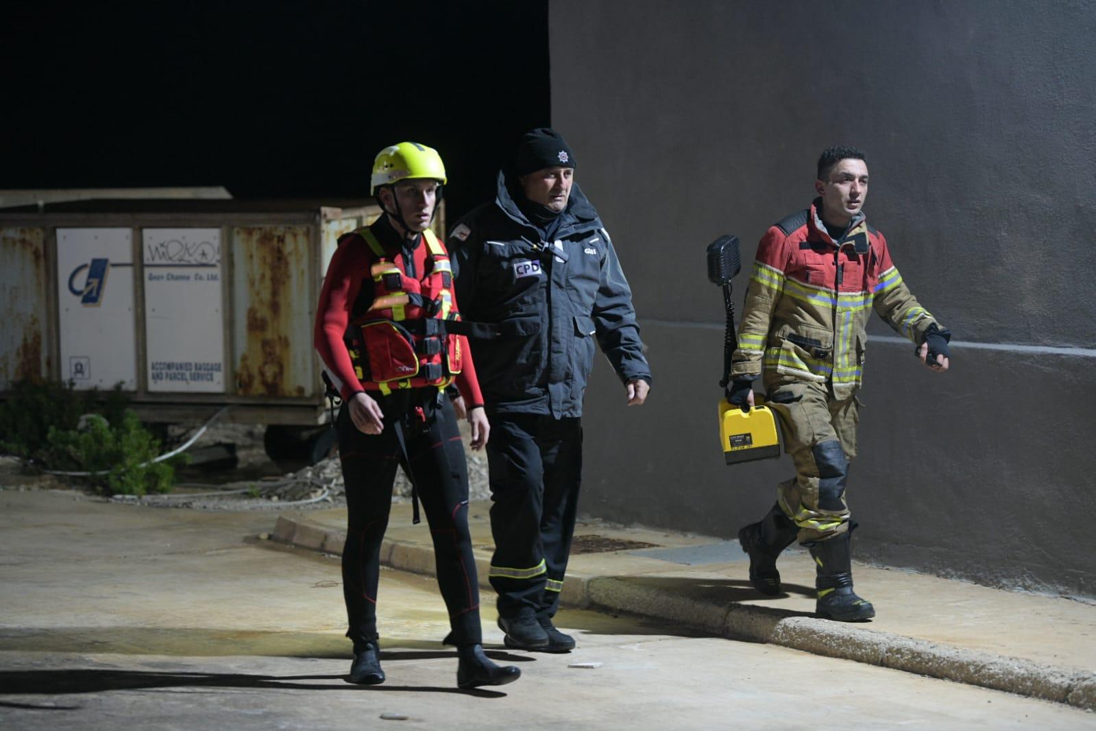 Rescuers at the scene. Photo: Matthew Mirabelli