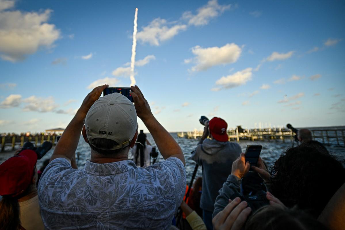 Space enthusiasts at a park in Titusville, view the Artemis II crewed lunar mission lift off from Pad 39B at Kennedy Space Centre. Photo: AFP
