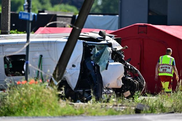 Four killed after train hits school bus in Belgium