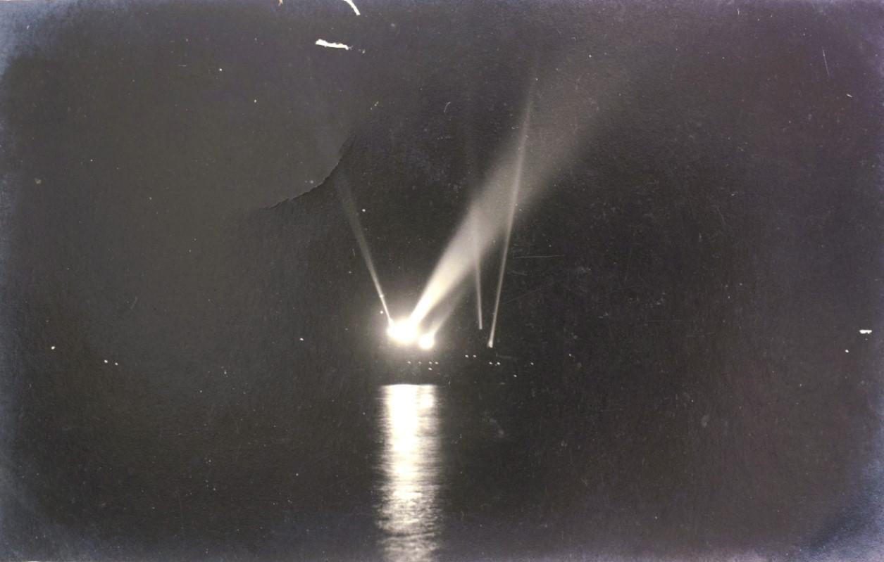 A inter-war searchlight display by an Italian warship in Grand Harbour.