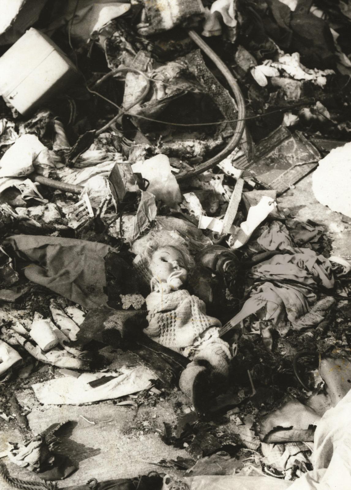 A doll lies among the wreckage of the disaster. Photo courtesy of Anthony Abela Medici