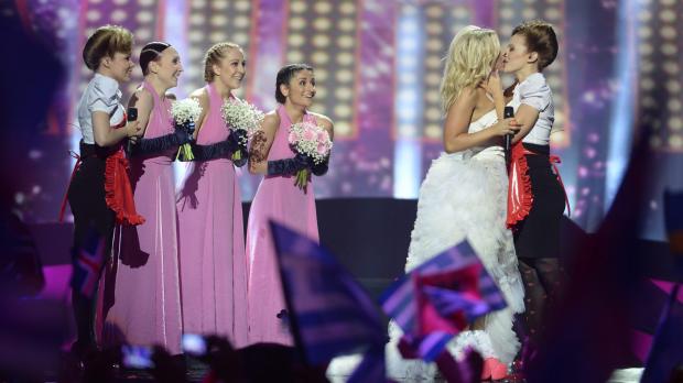Finland's on-stage kiss by two women in a song on marriage caused the broadcast of the show in Turkey to be banned.