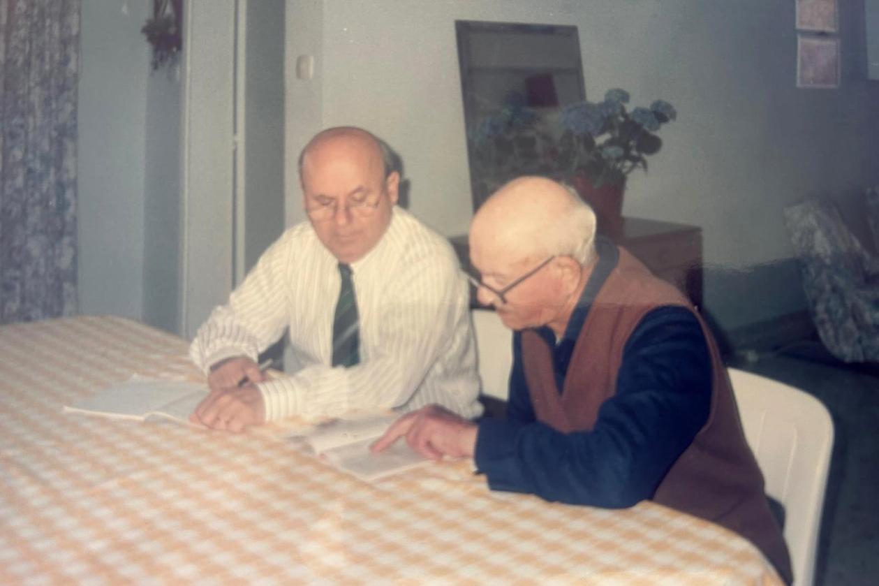 Nazzareno (left) pictured with Gianni Cilia giving him lessons in English. Cilia had earlier taught him Italian.
