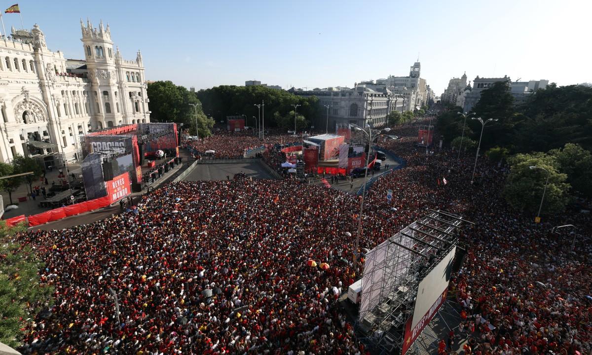 Spain fans pack Cibeles Square in Madrid as they await the arrival of Spain's players.
