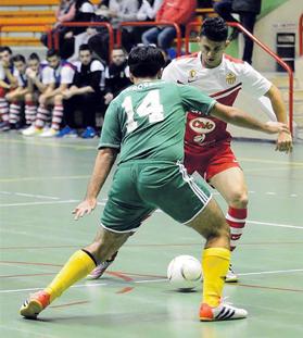 Lija&rsquo;s Ibrahim Massoudi (right) tries to dribble his way through against Gozo. Photo: Joe Borg