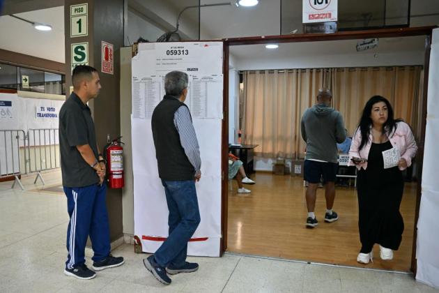 Polls open in tight Peru presidential runoff